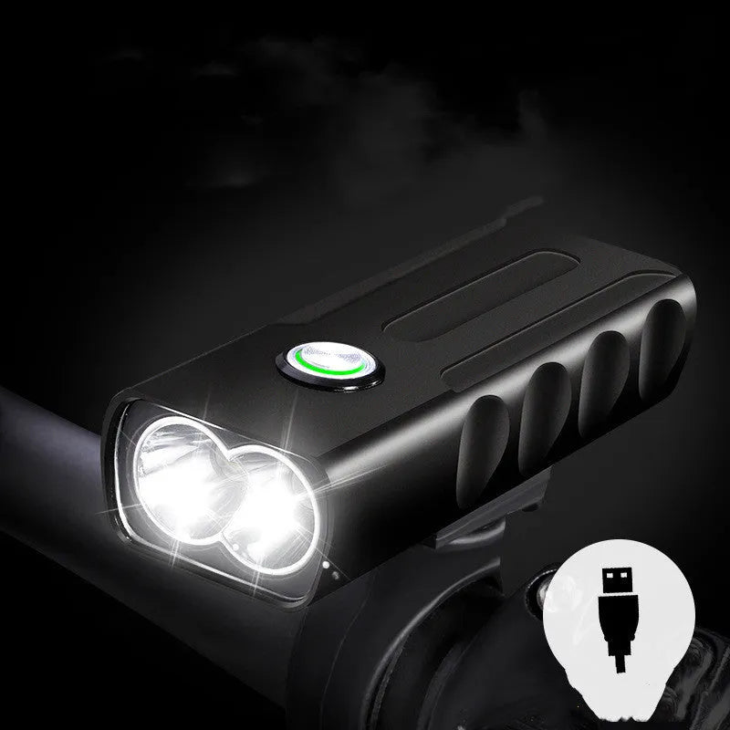 Black rechargeable bicycle headlight with aluminium alloy body and 360-degree bracket on handlebars