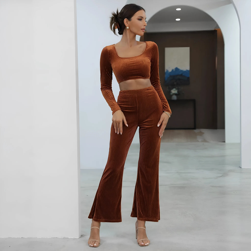 Caramel coloured long sleeve sweater and trousers co-ord set on a hanger