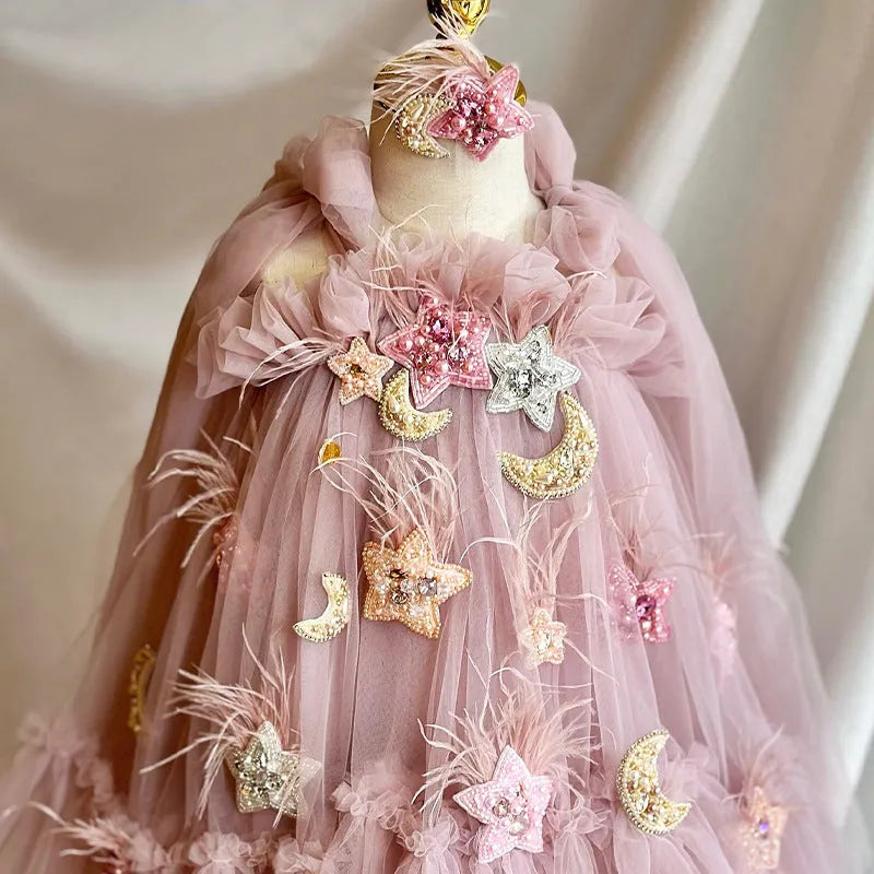Pink children's spaghetti-strap princess dress with flower print and bow detail, cotton lining, available in 100cm to 140cm height sizes