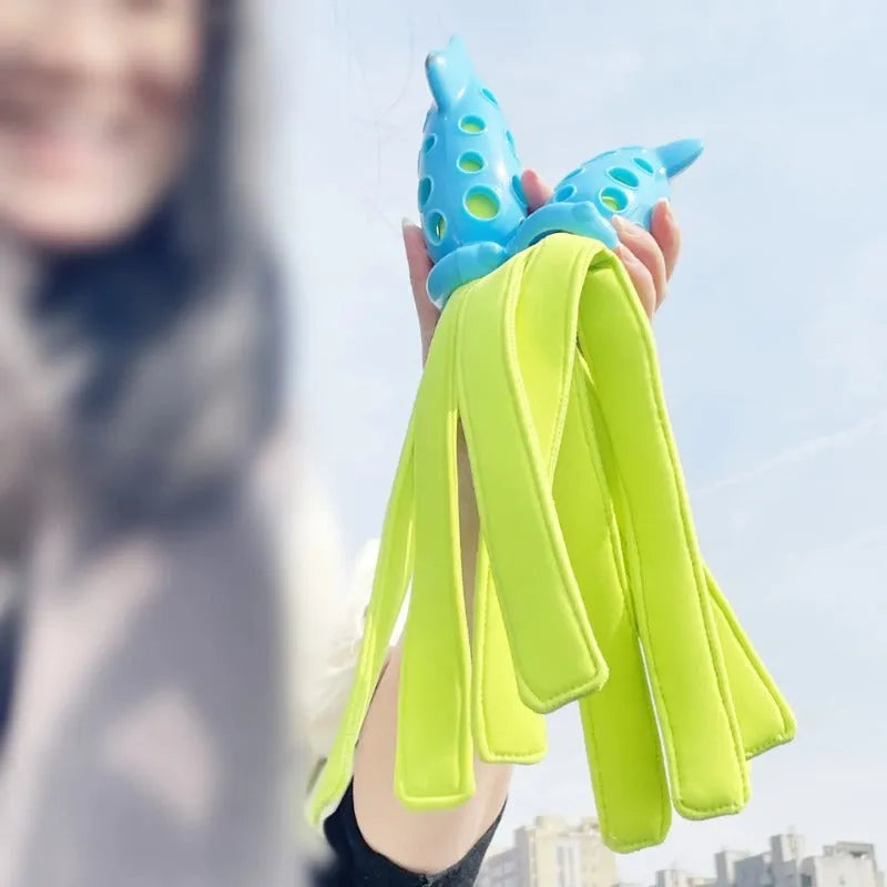 Blue squid-shaped dog chew toy with rubber tentacles and waterproof cloth elements measuring approximately 39cm