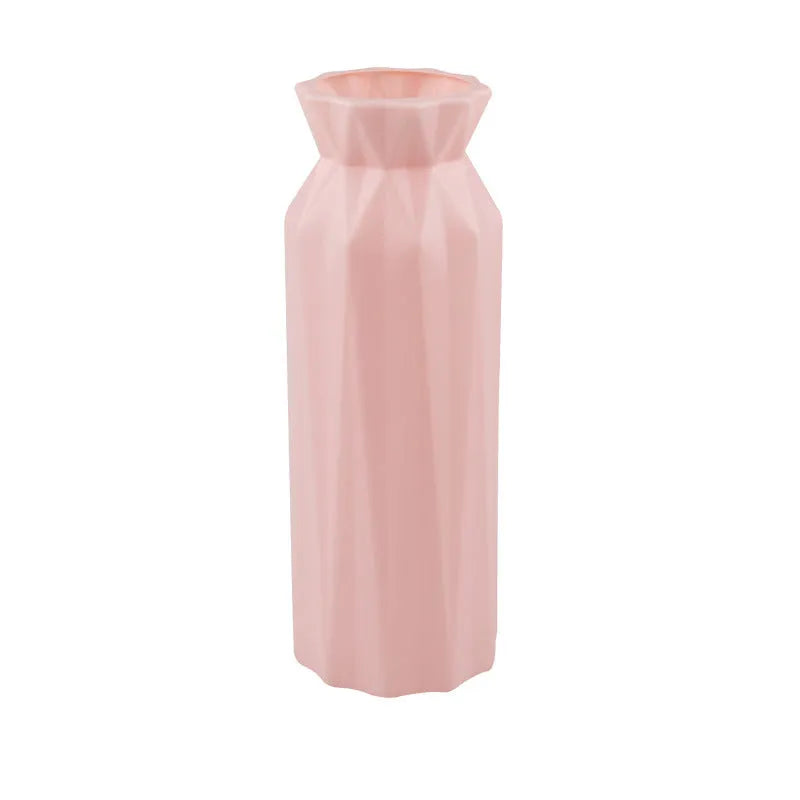 Drop-resistant plastic melamine vase in green, grey, pink, or white colour on a table.