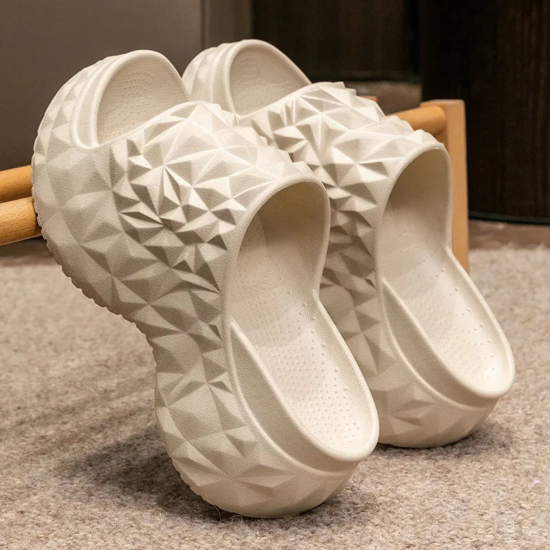 Khaki coloured EVA high heel flip flop slippers with a thick, textured sole.