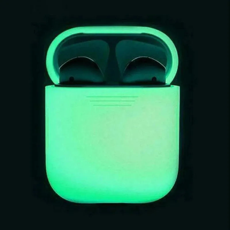 Glow-in-the-dark silicone flip cover case for Apple AirPods charging case on a dark background
