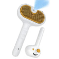 White pet grooming brush with steam spray function and self-cleaning mechanism