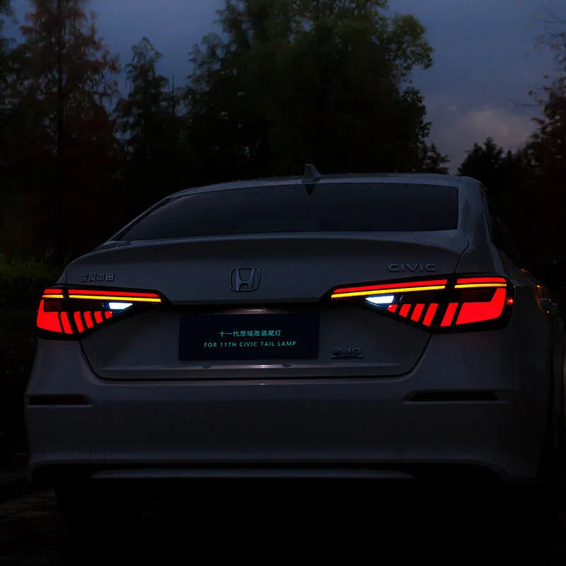 Black and red LED taillight assembly for 11th Generation Honda Civic with sequential light strip.