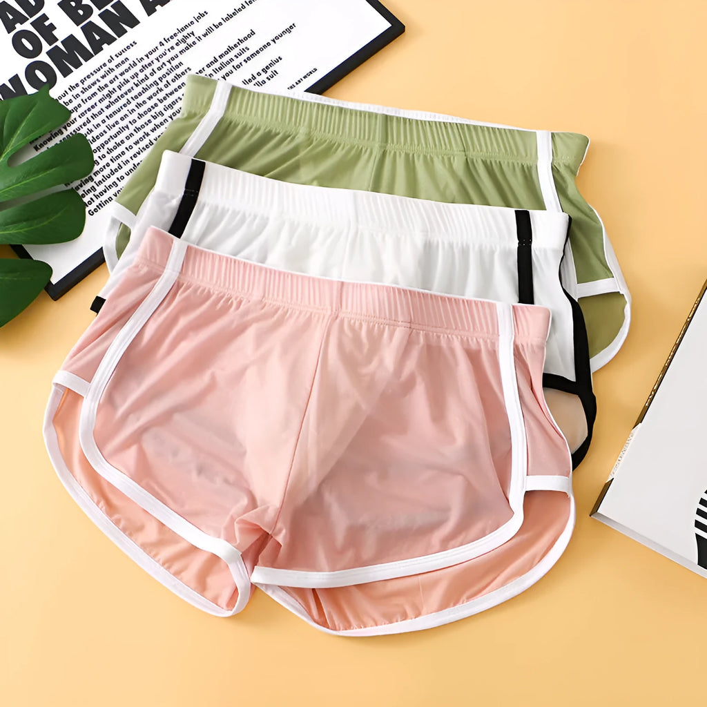 Men's ice silk mesh boxer shorts in various colours on a white background.