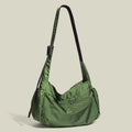 Large black nylon waterproof messenger bag with shoulder strap showing horizontal square shape