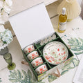 Ceramic tableware gift box set with 4 bowls, 4 spoons, and 2 plates in matching underglaze finish