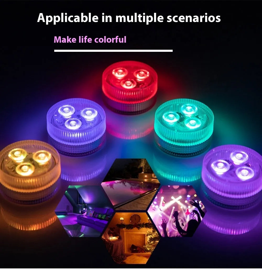 Small round remote control LED diving light for aquarium next to its multi-button remote on a table.