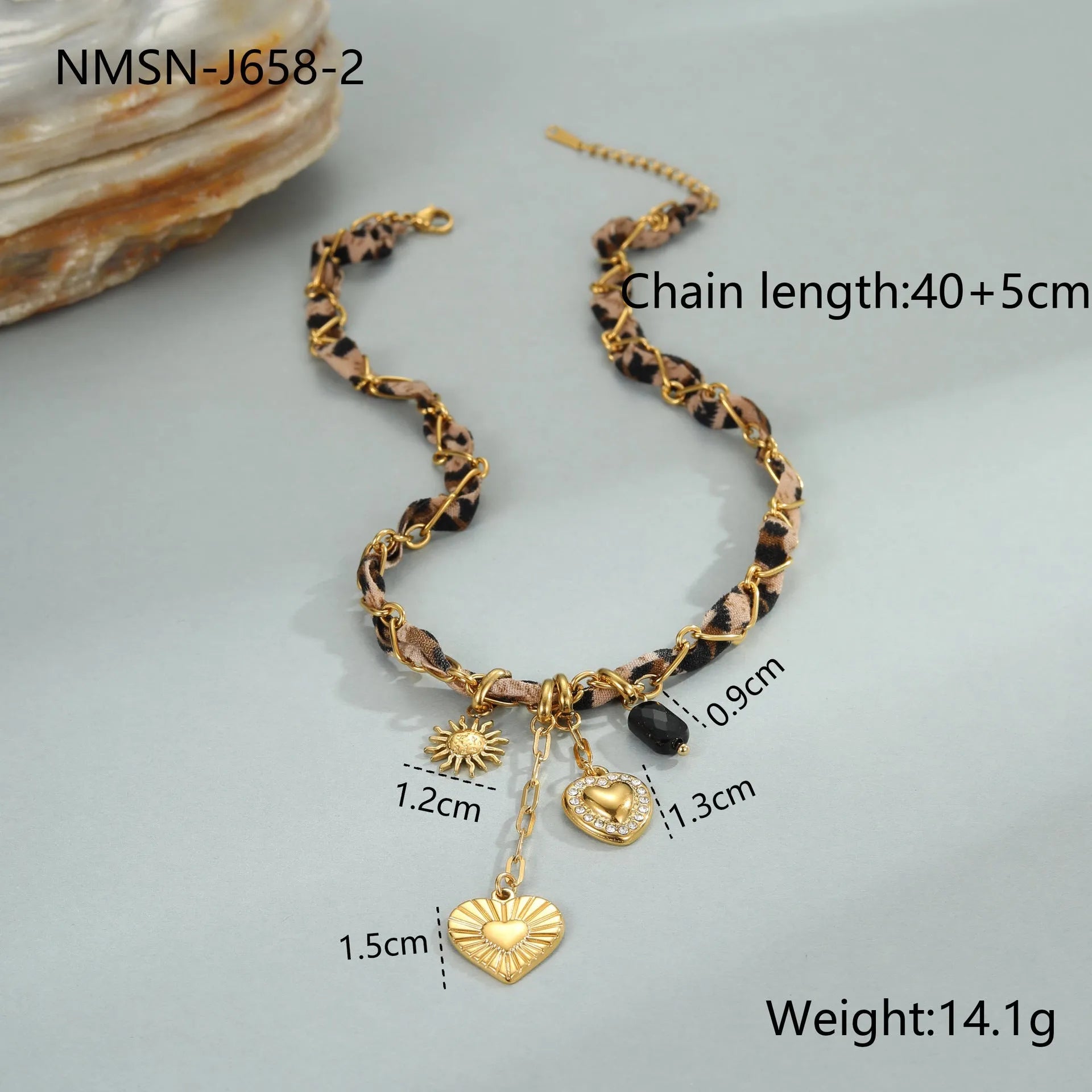 Geometric leopard love pendant necklace on a stainless steel chain with 18K gold electroplate.