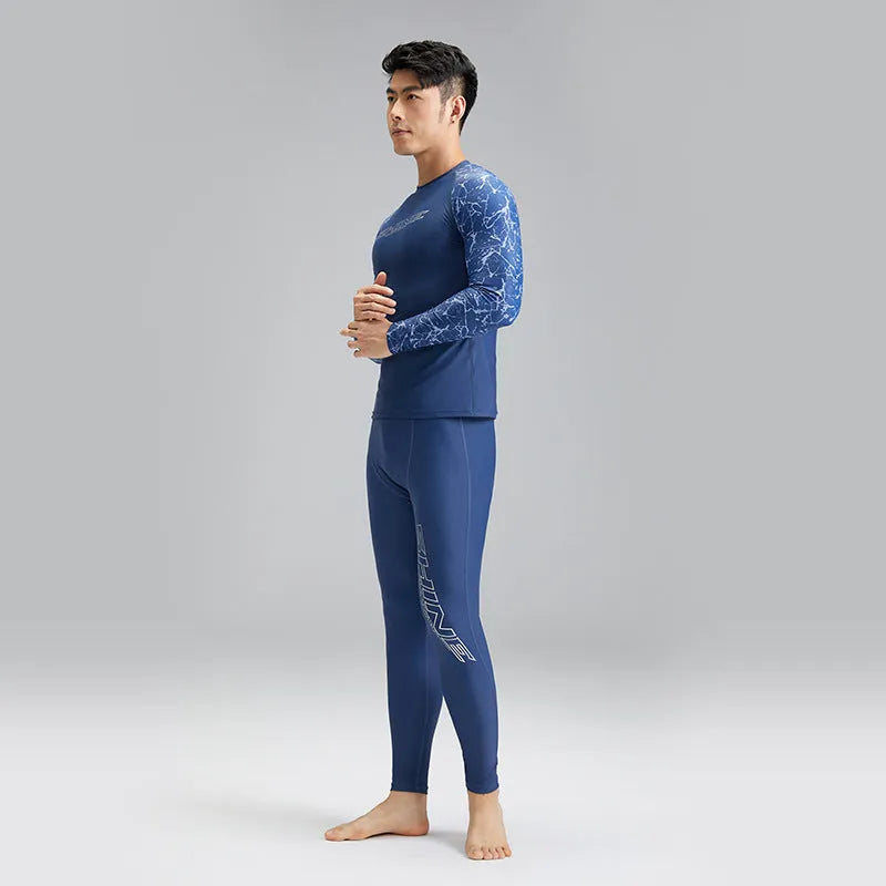 Men's dark blue patterned nylon swimwear set with matching top and trousers