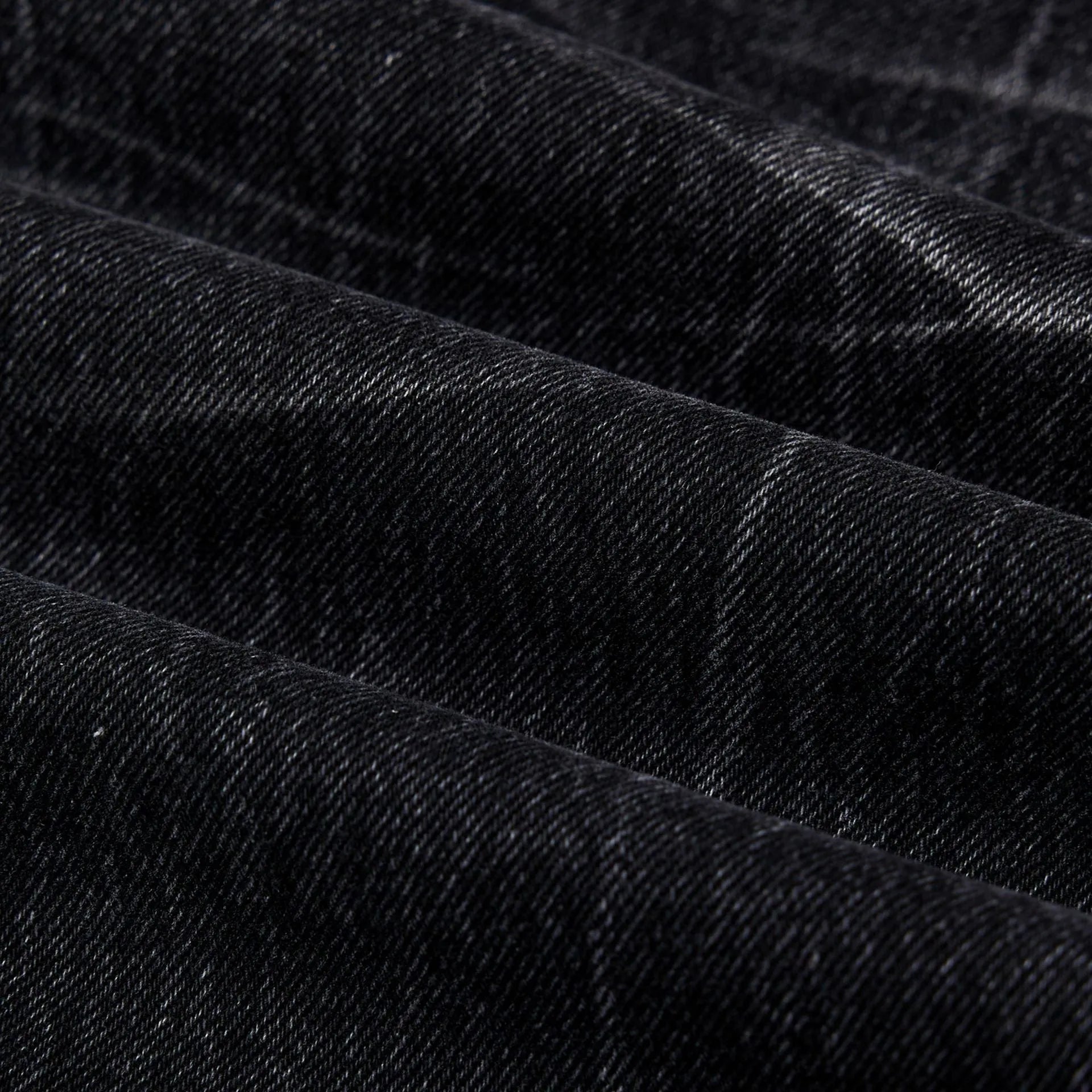 Black mens straight-leg jeans with American washed lightning crack detailing on cotton fabric