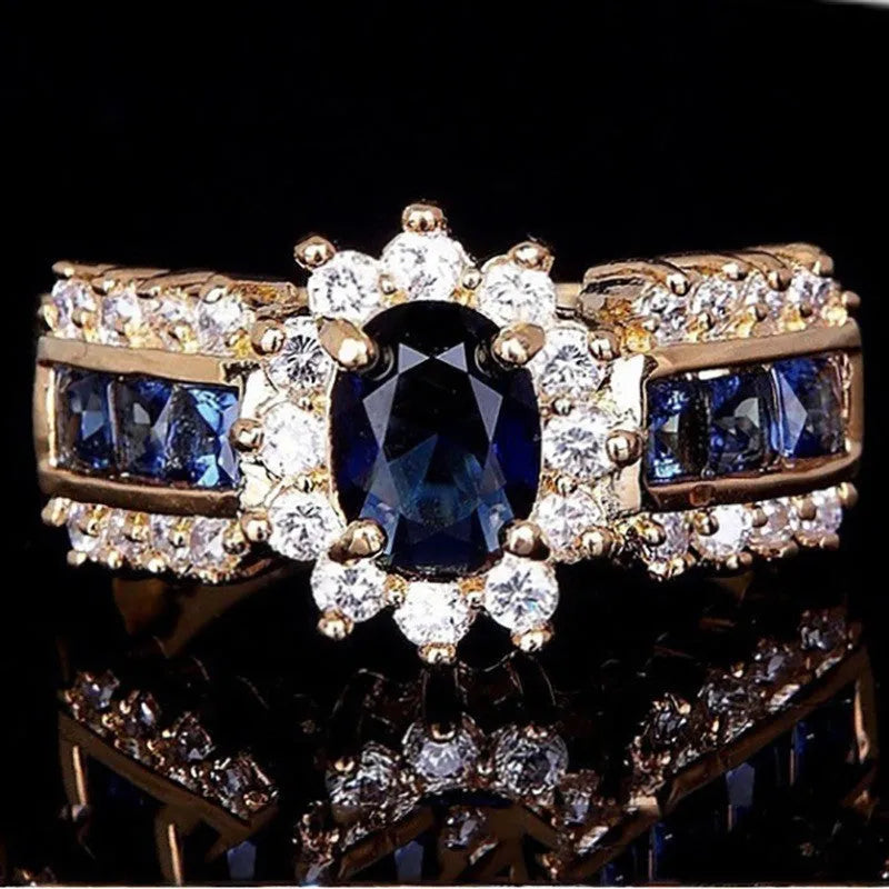 Personalised fashion rings with diamond treatments in blue and purple designs on zinc alloy