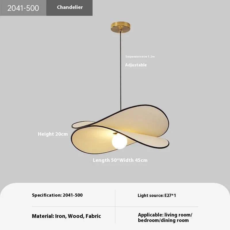French style fabric potato chip chandelier pendant light in white, shown in a bedroom setting.