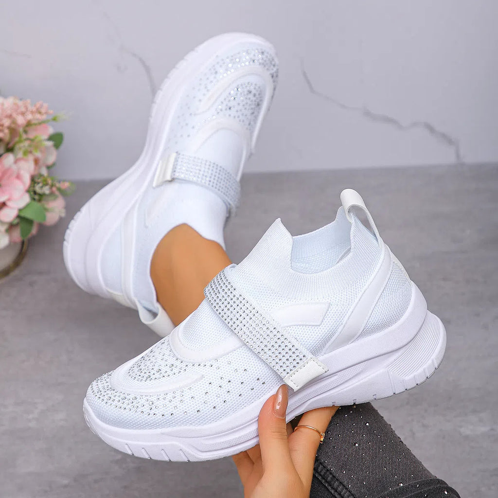 Women's slip-on breathable mesh wedge sneakers in pink with rhinestone accents and wedge heel