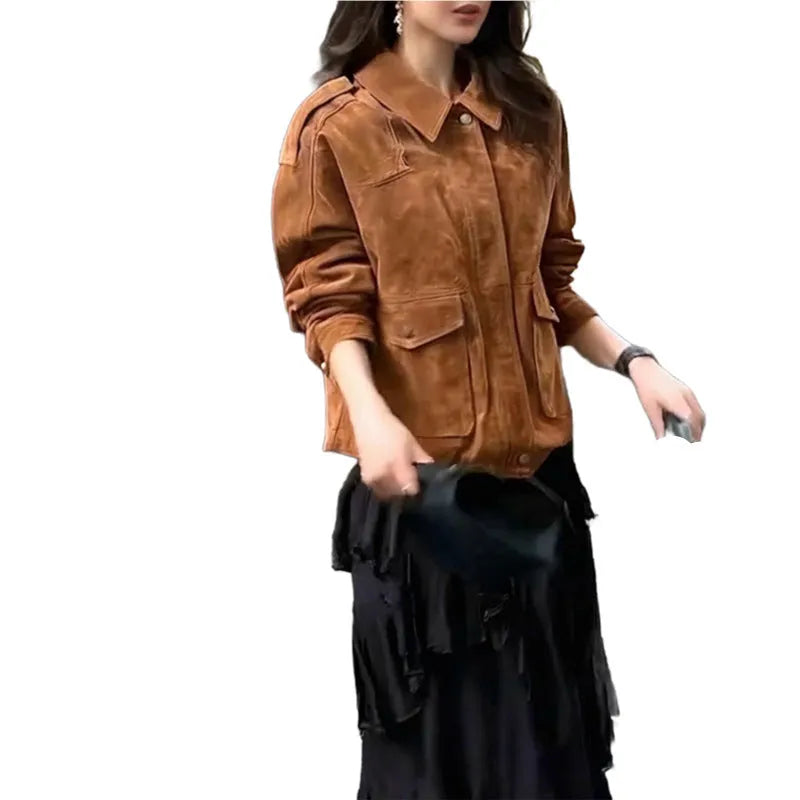 Brown suede-look polyester women's coat with regular sleeves on a hanger.