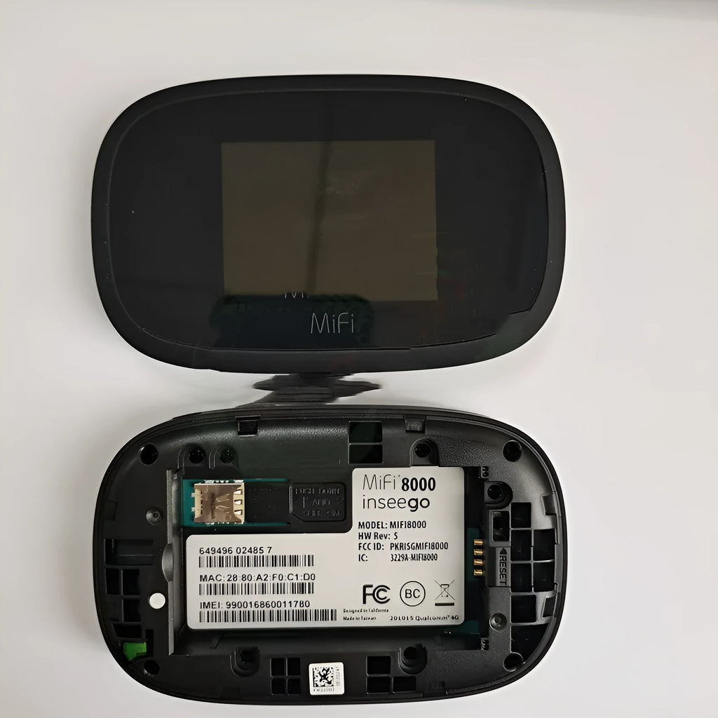 Black Full Network mifi8000 4G portable wireless router with battery and USB cable on a table