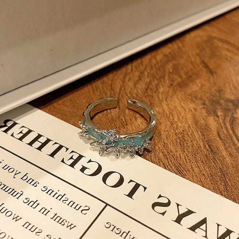 Simple copper women's ring with a Chinese butterfly design, showing an example from the 33 available numbered styles.