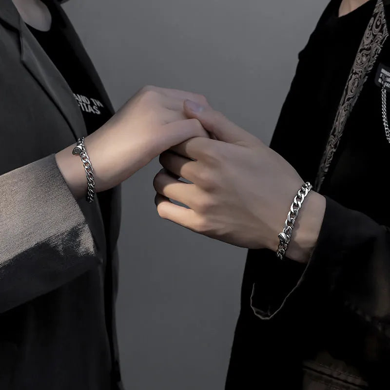 Magnetic couple bracelet set with silver heart charm on stainless steel chain