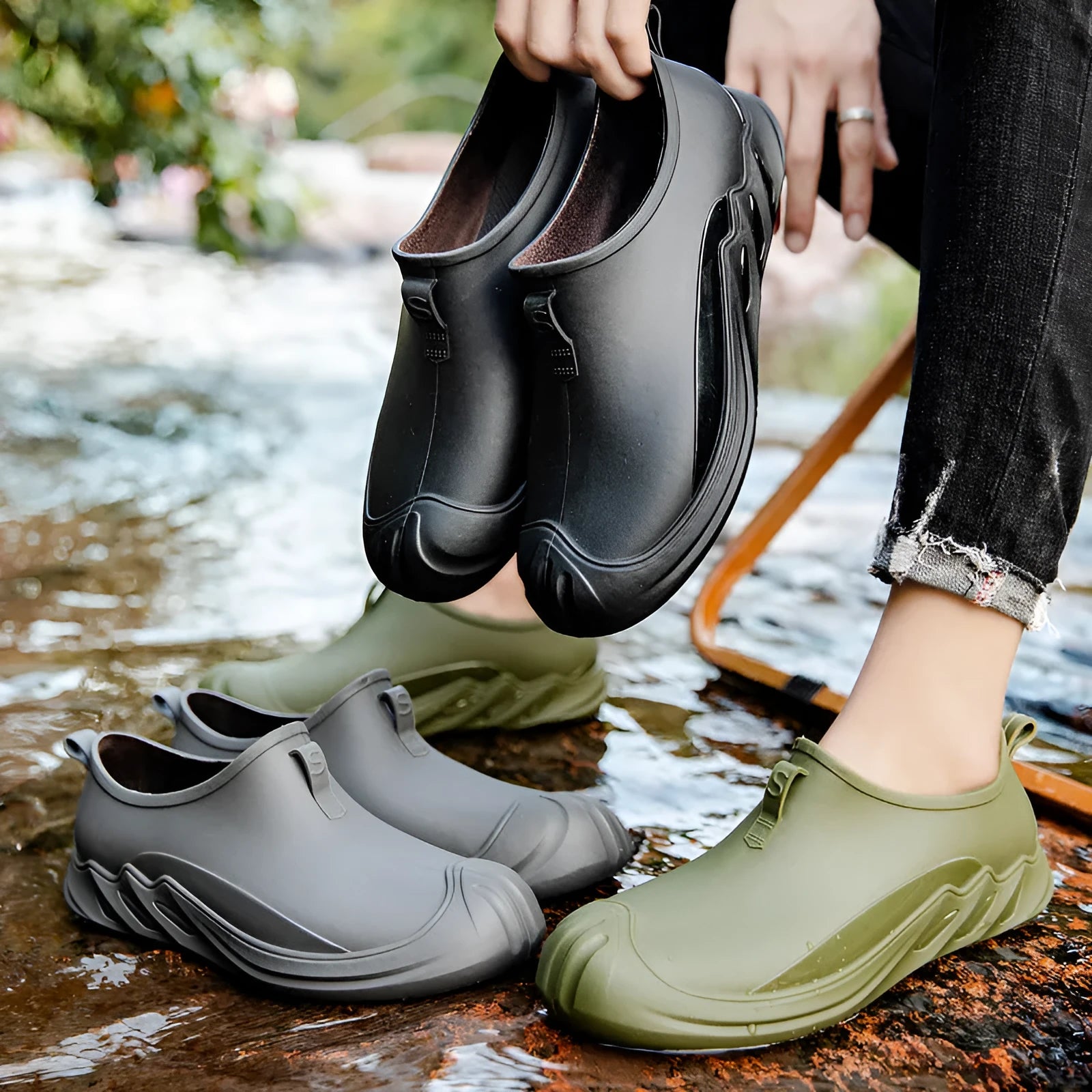Men's short rain boots in black plastic waterproof construction