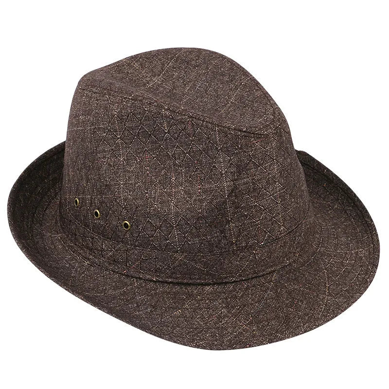A man's brown fedora hat with a pinched crown and a medium-width brim on a wooden table.