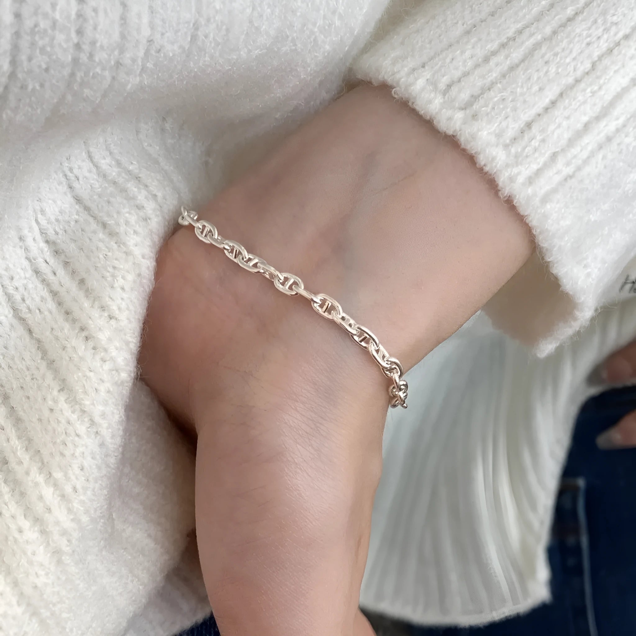 Minority stackable bracelet in polished 925 sterling silver pig nose chain style on white background
