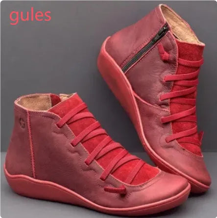 Women's casual flat boots with a wedge heel and round toe in various colours.