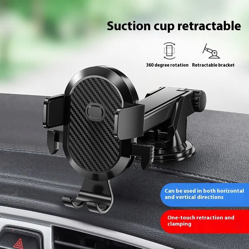 Black plastic manual car phone holder clipped to a vehicle air outlet vent