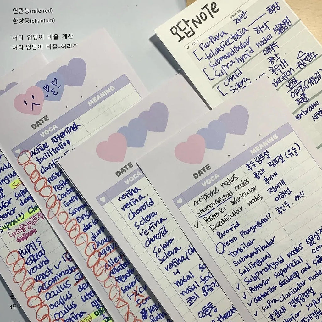 Vertical half-B5 notepad with printed lines for English words, in blue cover.