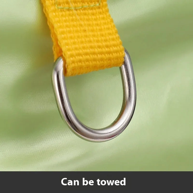 Green waterproof four-legged dog coat with cotton padding on a medium-sized dog