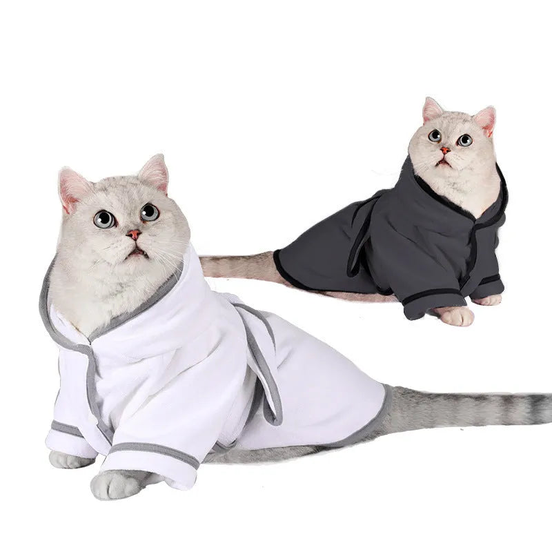Grey absorbent four-legged pet bathrobe for dogs and cats, soft fabric with full body coverage on a small dog