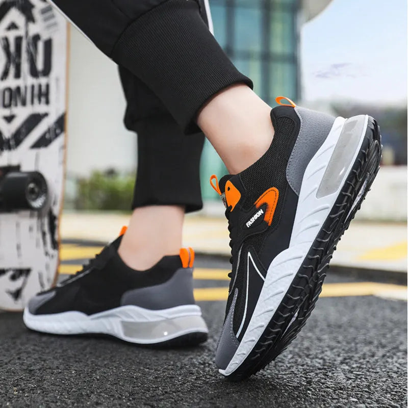 Colour-blocked men's mesh trainers with rubber sole, front lace-up, flat heel, round toe, in Black Green, Black Orange, or Grey Orange.