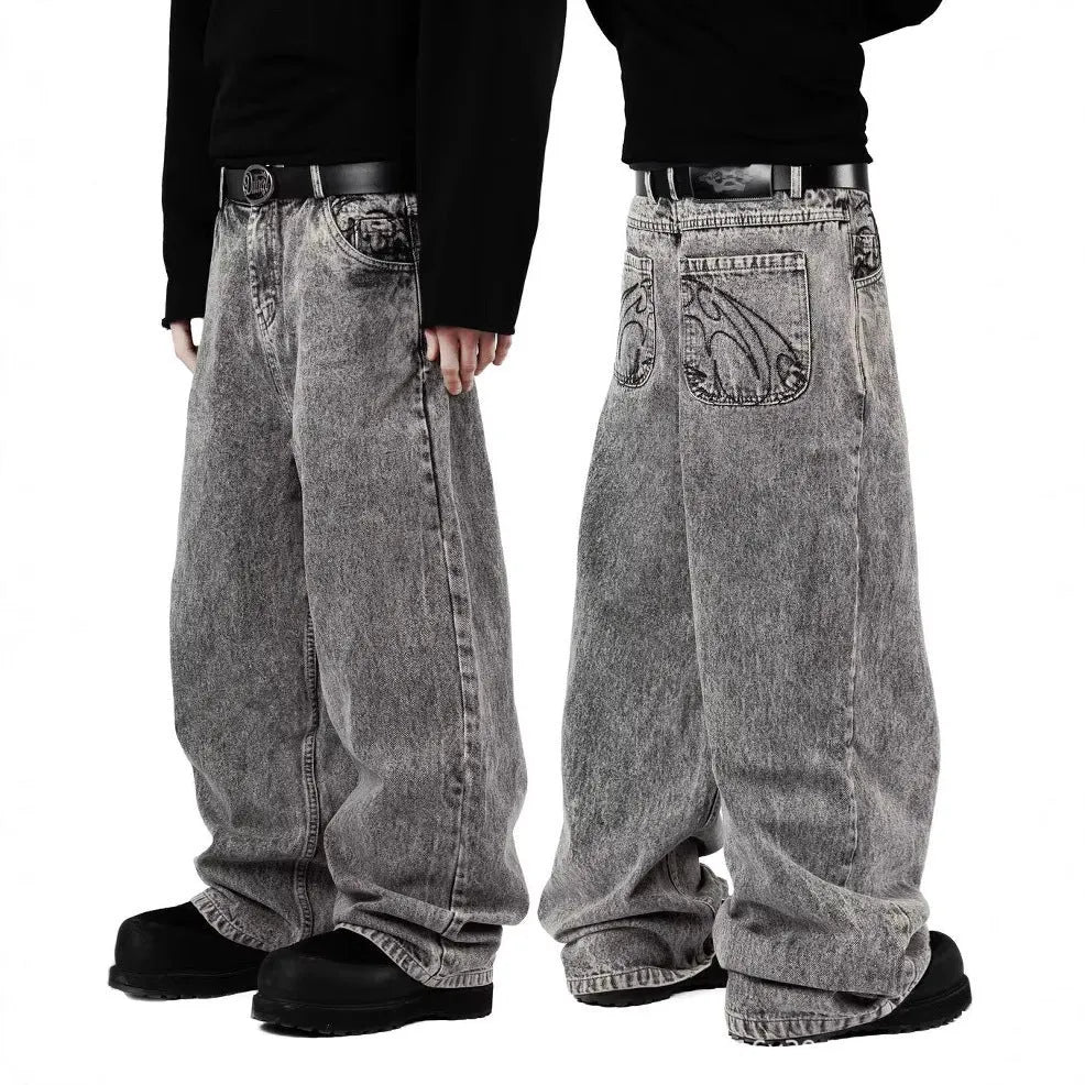 Grey loose fit straight-leg denim trousers on a mid-waist hanger