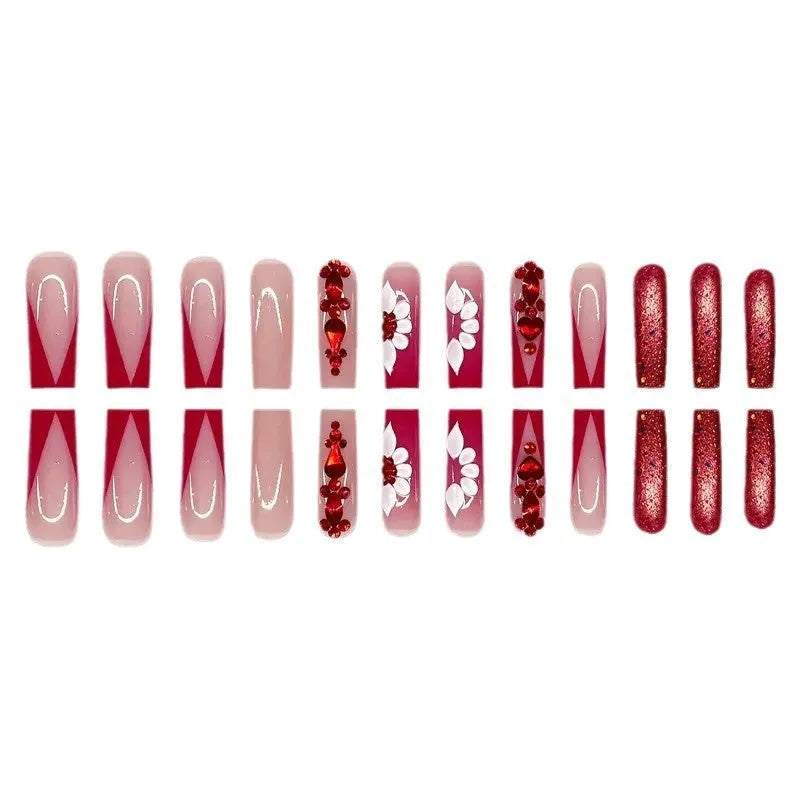 Sweet floral pattern fake nails with red diamond accents in European square long shape