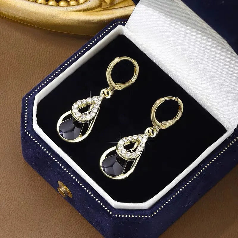 Black diamond-inlaid drop earrings with hollow double-layer alloy droplet design for women