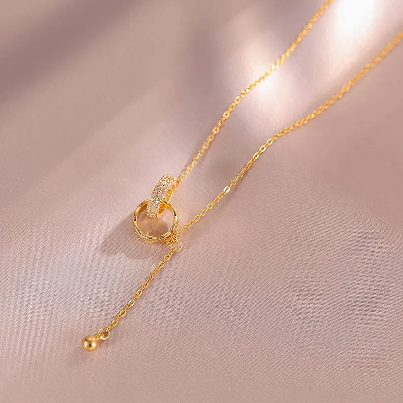 Titanium steel tassel clavicle chain necklace with double ring pendant in gold or silver finish