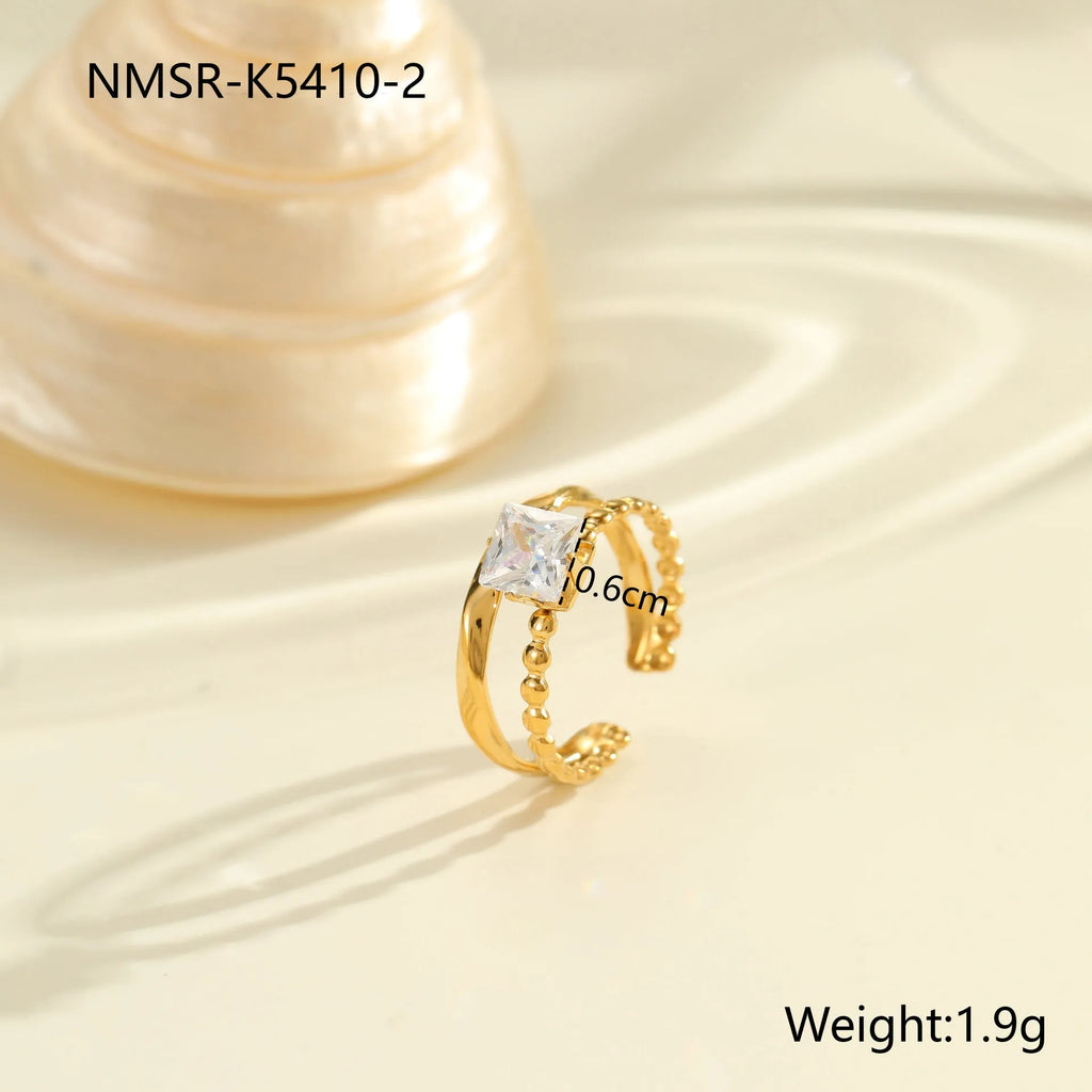 Gold electroplated stainless steel open mouth ring with zircon decoration and geometry design
