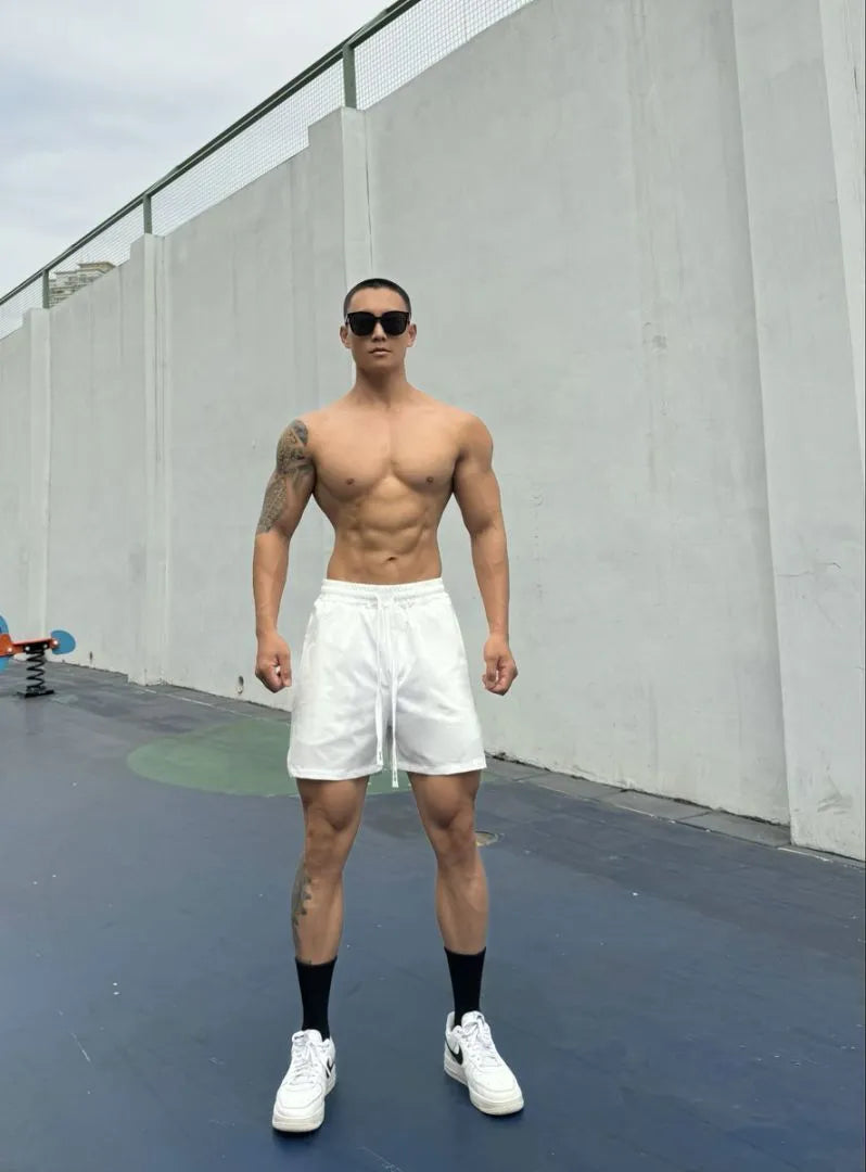 Men's black ice silk quick-drying double-layer casual shorts laid flat