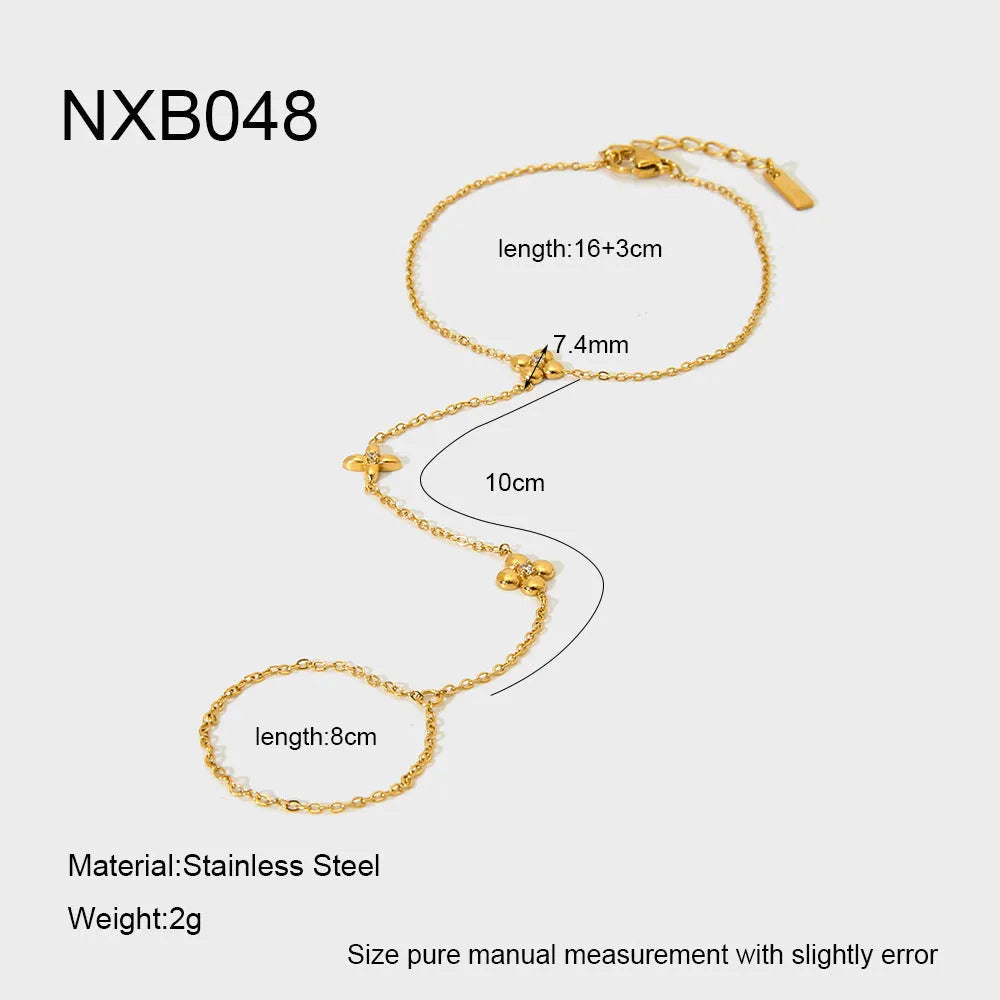 Women's stainless steel bracelet with geometric floral and eight-pointed star design in gold colour