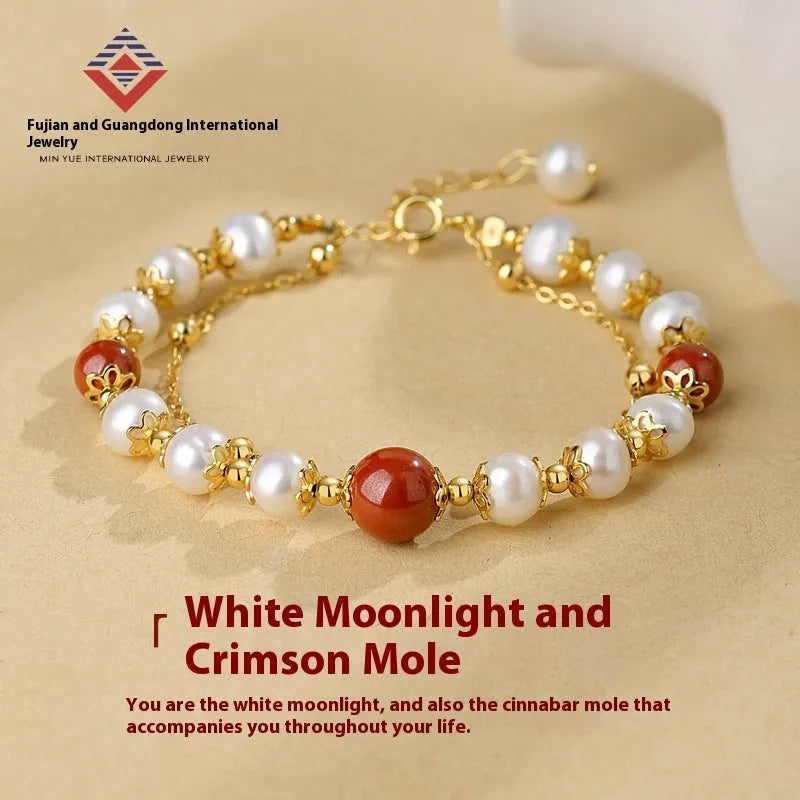 Sterling silver double layer bracelet with cinnabar red beans and white freshwater pearl charms