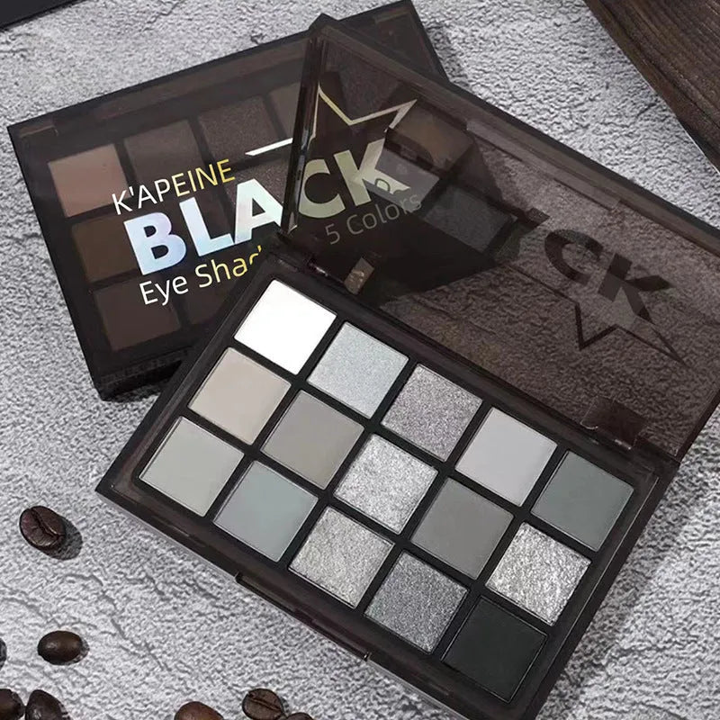15-colour eye shadow palette showing matte shimmer shades including grey black and brown blue colours
