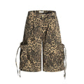 Women's high-waisted leopard print cropped trousers with a loose straight leg and button fly.