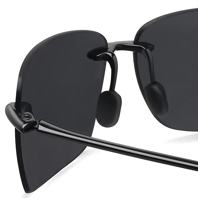 Rimless TR90 men's sunglasses with TAC UV400 lenses, shown in Black, Blue, Green, Grey, and Tea colour options.