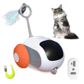 Blue smart cat toy car with feather teaser attachment and remote control on floor