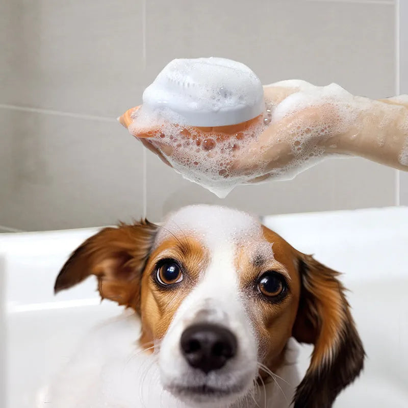 Orange TPR dog shampoo brush with silicone comb teeth and pumpkin-shaped ergonomic handle