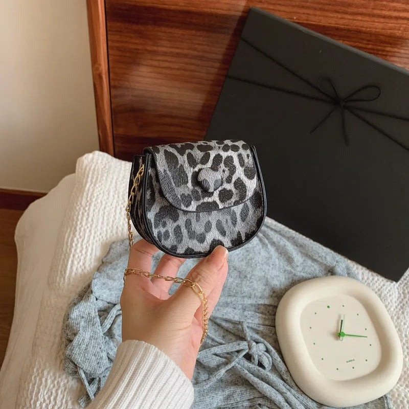 Mini leopard print PU saddle bag in horizontal square shape, with sandwich pocket, black or reddish brown
