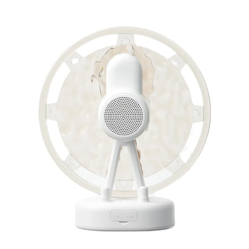White Ferris wheel Bluetooth speaker with colourful atmospheric lighting effects on display