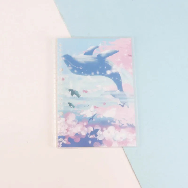 Children's hand-ledger notebook with hardcover showing animal designs including whale and fruit patterns