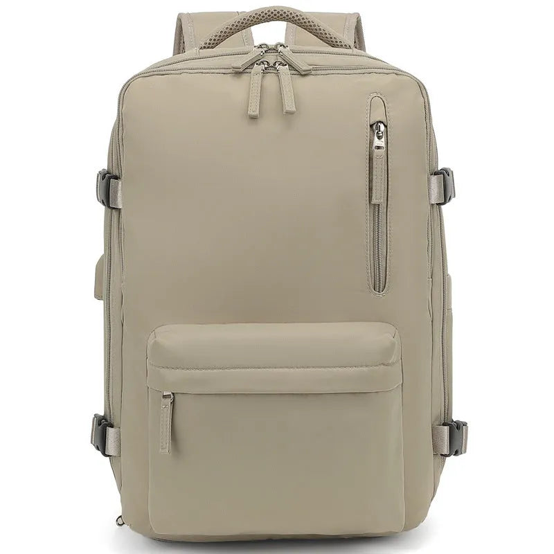 Women's large capacity lightweight Oxford cloth travel backpack in forest green colour with curved shoulder straps