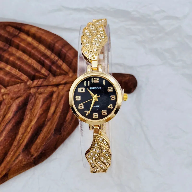 Women's stainless steel watch with round dial and Vachette clasp in gold, black and gold, or gold and white colours